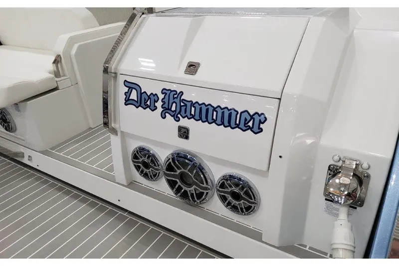 Slide: The Image of 2023 Formula 500 Super Sport Crossover boat with "Der Hammer" text and speakers. - 41