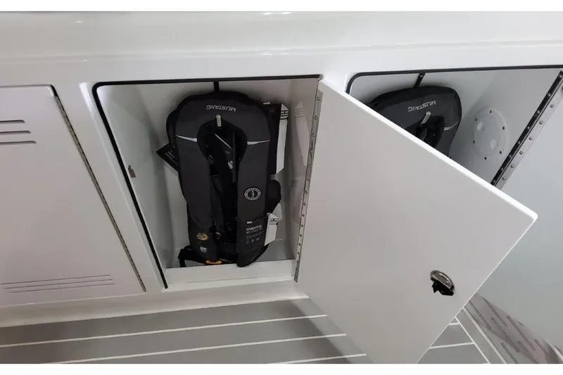 Slide: The Image of 2023 Formula 500 Super Sport Crossover storage compartment with safety equipment. - 49