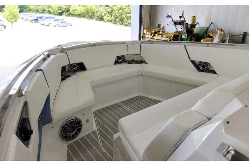 Slide: The Image of 2023 Formula 500 Super Sport Crossover boat interior with white seating and speakers. - 51