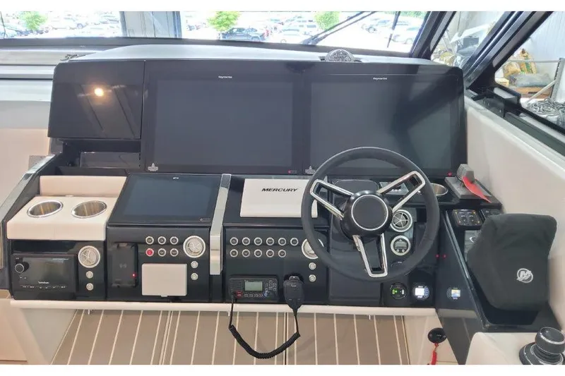 Slide: The Image of 2023 Formula 500 Super Sport Crossover helm with advanced navigation controls and sleek design. - 60