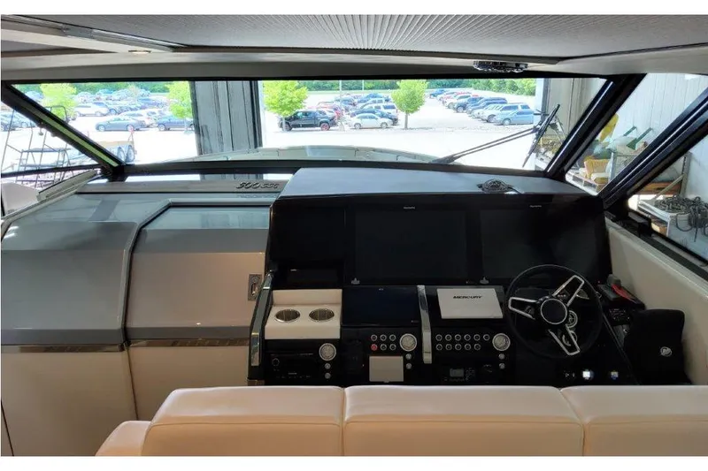 Slide: The Image of 2023 Formula 500 Super Sport Crossover helm with modern controls and panoramic windows. - 61