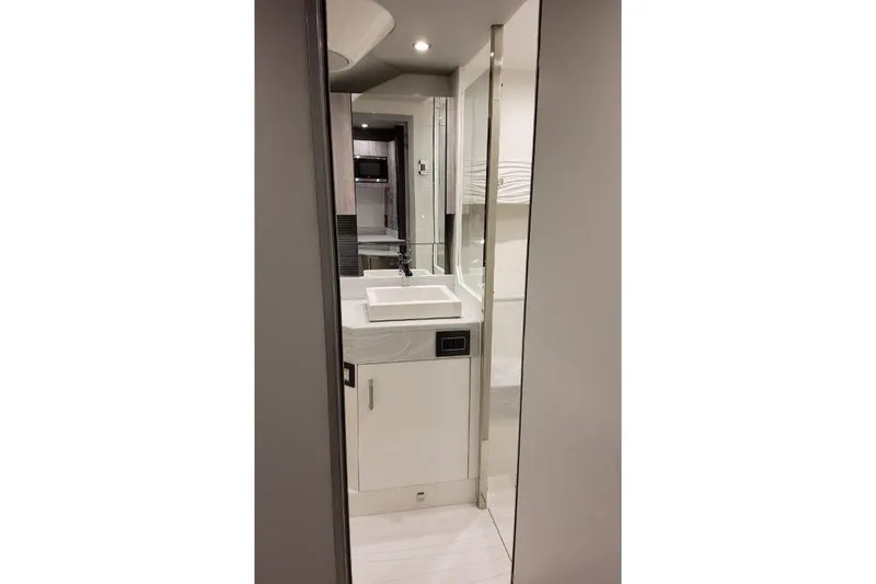 Slide: The Image of 2023 Formula 500 Super Sport Crossover bathroom interior with modern sink and sleek design. - 74