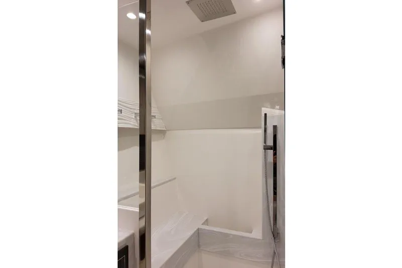 Slide: The Image of 2023 Formula 500 Super Sport Crossover interior shower with modern design and sleek fixtures. - 76