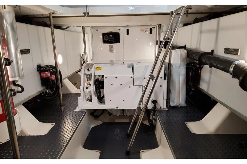 Slide: The Image of Engine room of 2023 Formula 500 Super Sport Crossover boat, showcasing equipment and layout. - 82