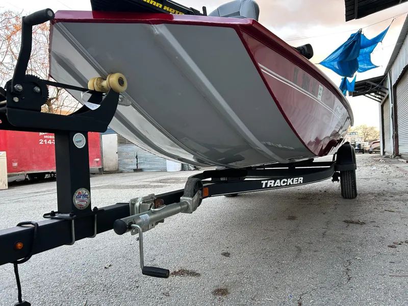 Slide: The Image of 2019 Tracker Pro 160 boat on trailer, parked outdoors. - 11