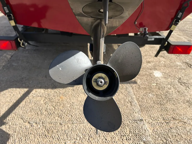 Slide: The Image of 2019 Tracker Pro 160 boat propeller on a trailer, close-up view. - 18