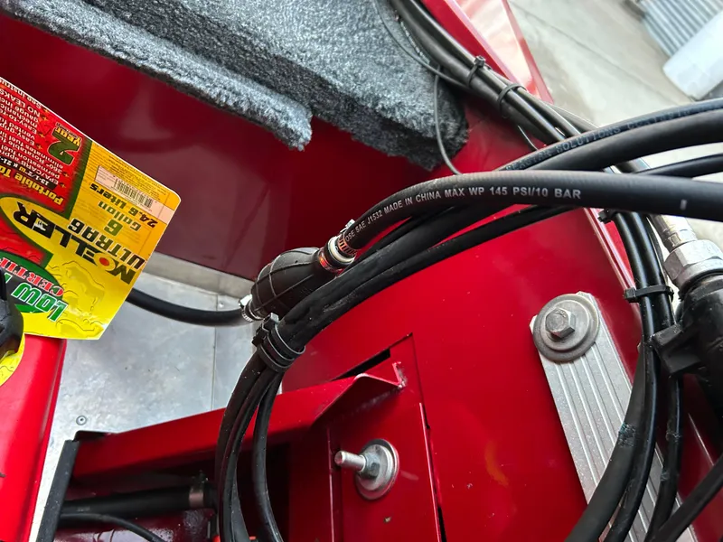 Slide: The Image of Close-up of 2019 Tracker Pro 160 boat wiring and components. - 29