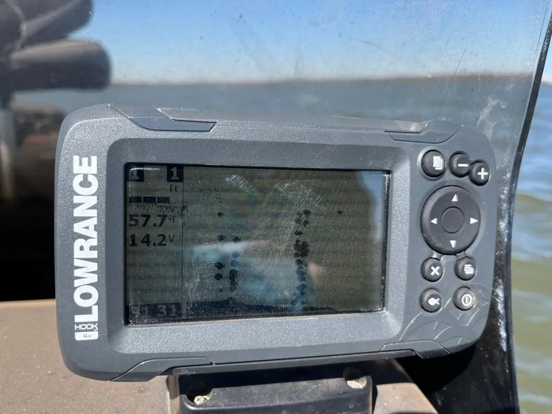 Slide: The Image of Lowrance fish finder on 2019 Tracker Pro 160 boat, displaying water depth and voltage. - 34