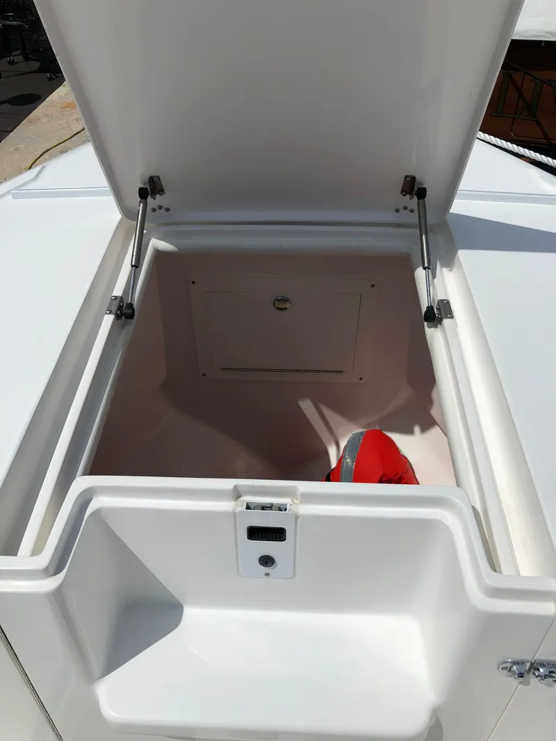 Slide: The Image of Open storage compartment on a 2008 Intrepid 370 boat. - 17