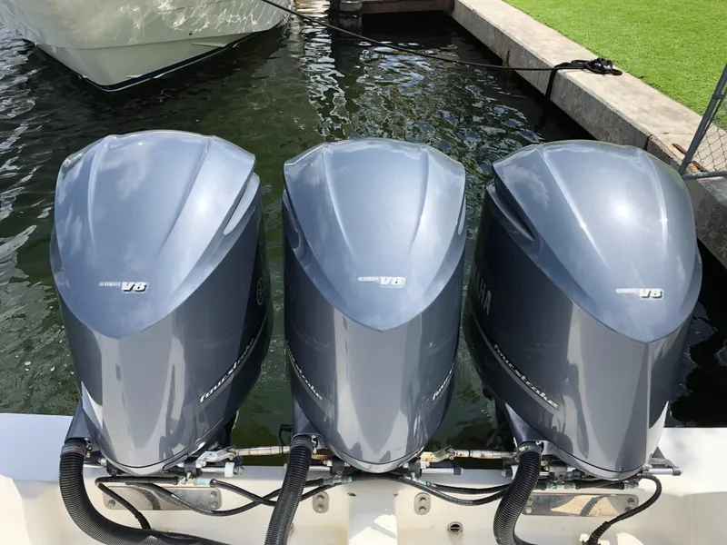 Slide: The Image of Three Yamaha V8 outboard engines on a 2008 Intrepid 370 boat. - 22