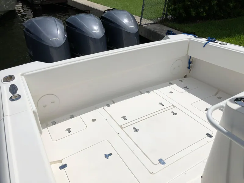 Slide: The Image of 2008 Intrepid 370 boat deck with triple outboard engines. - 8