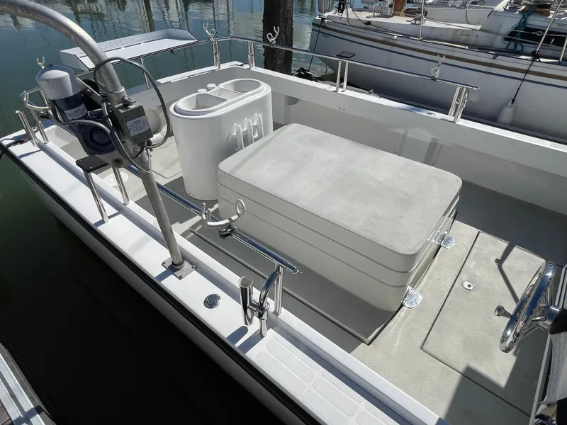 Slide: The Image of 2016 Farallon 3200 Explorer boat deck with seating and storage. - 10