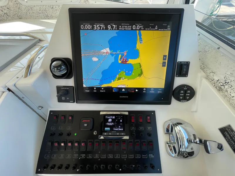Slide: The Image of Control panel of 2016 Farallon 3200 Explorer with navigation display. - 14