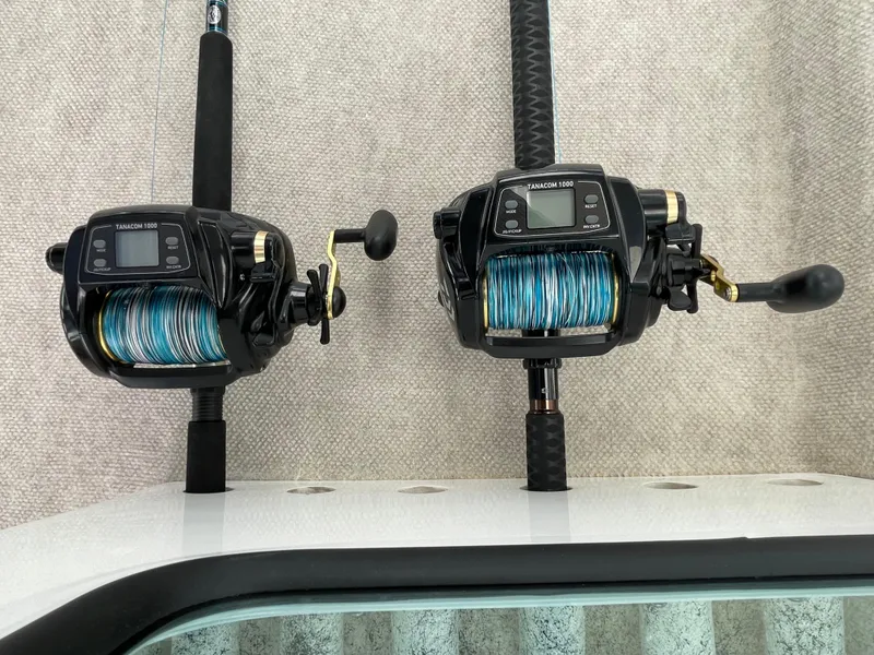 Slide: The Image of Two electric fishing reels mounted on a Farallon 3200 Explorer, 2016 model. - 30