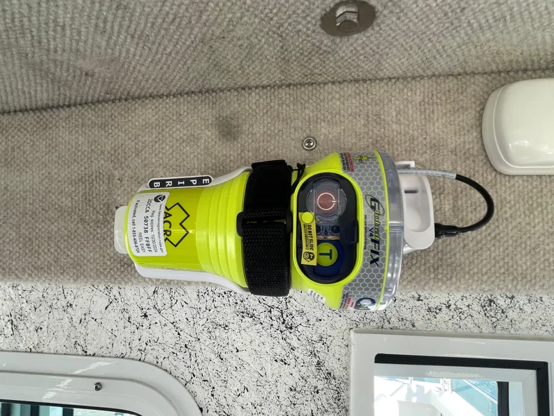 Slide: The Image of Emergency locator beacon inside a 2016 Farallon 3200 Explorer boat. - 32