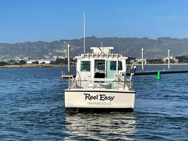 Slide: The Image of Farallon 3200 Explorer boat "Reel Easy" on San Francisco waters, 2016 model. - 7