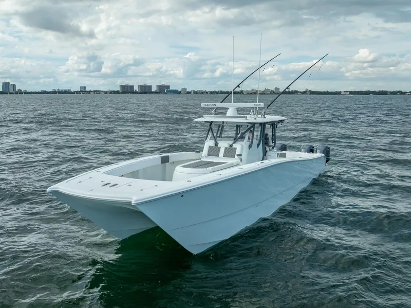 Slide: The Image of 2017 Freeman 42 boat on open water under cloudy sky. - 10