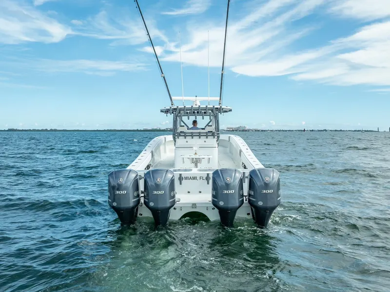 Slide: The Image of Freeman 42 boat with four engines on open water, 2017 model. - 12