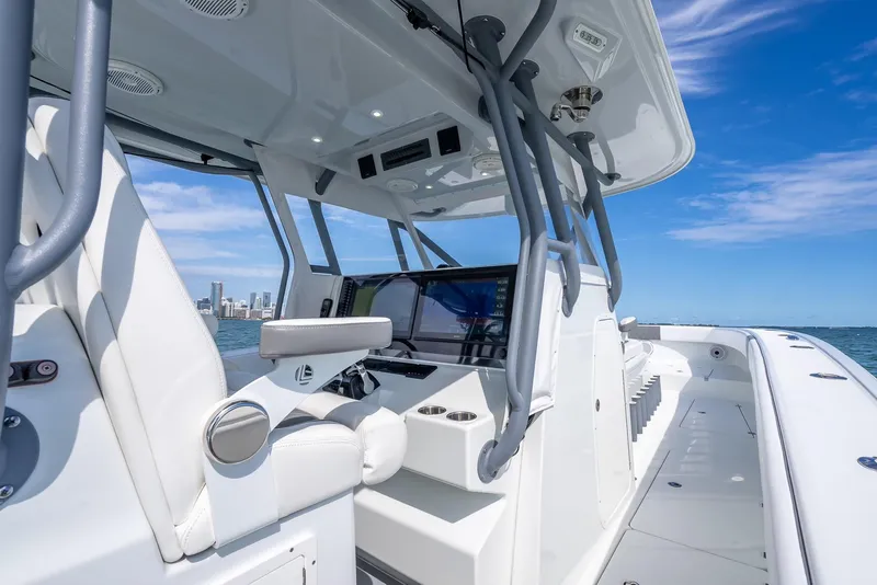 Slide: The Image of Freeman 42 boat interior, 2017 model, featuring sleek design and advanced navigation equipment. - 26