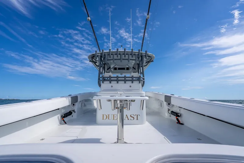 Slide: The Image of Freeman 42 boat deck, 2017 model, under clear blue sky. - 36