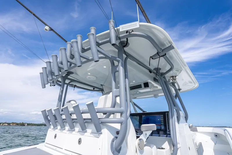 Slide: The Image of Freeman 42 boat, 2017 model, featuring a sleek design with multiple rod holders. - 41