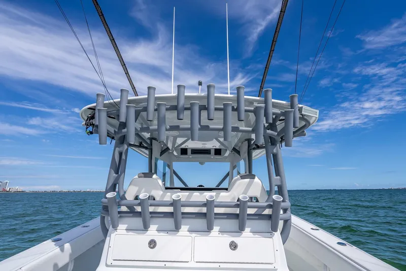 Slide: The Image of 2017 Freeman 42 boat on open water under clear blue sky. - 43