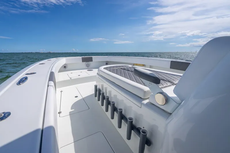 Slide: The Image of Freeman 42 boat deck, 2017 model, on open sea under clear blue sky. - 47