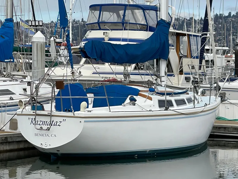 Slide: The Image of 1984 Catalina 30 sailboat "Kizmetaz" docked in Benicia, CA marina. - 1