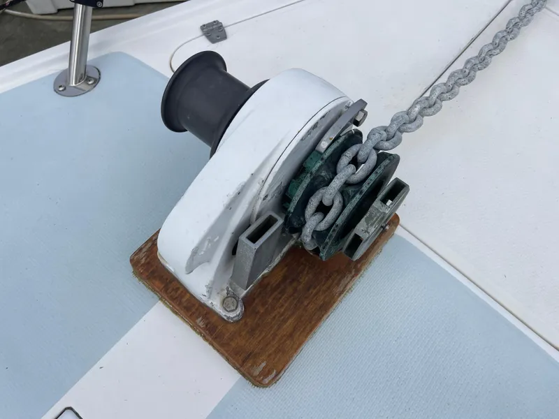Slide: The Image of Anchor windlass on 1984 Catalina 30 sailboat deck. - 19
