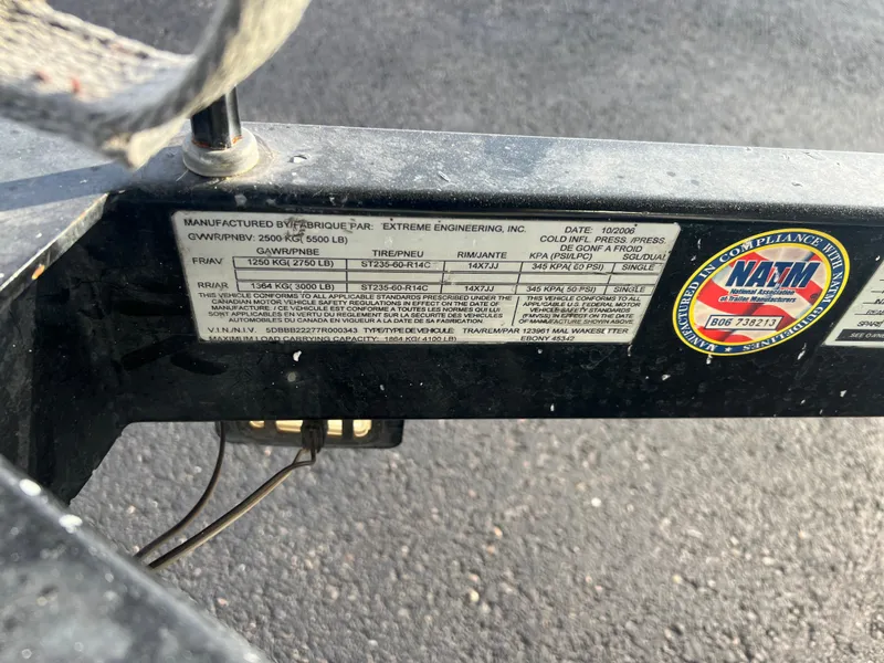 Slide: The Image of Label on a 2007 Malibu WVLX trailer, showing specifications and compliance details. - 18