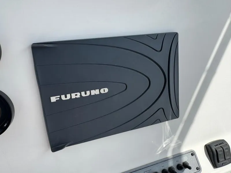 Slide: The Image of Furuno marine electronics on 2016 Wellcraft 252 Fisherman boat dashboard. - 10
