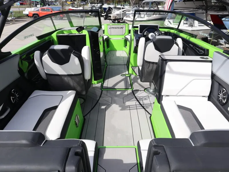 Slide: The Image of Interior of 2022 Yamaha Boats 255XD, featuring modern seating and sleek design. - 10