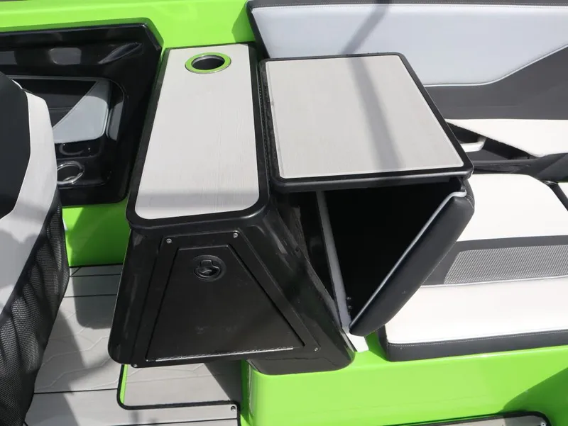 Slide: The Image of Interior of 2022 Yamaha Boats 255XD, featuring sleek seating and storage compartments. - 14