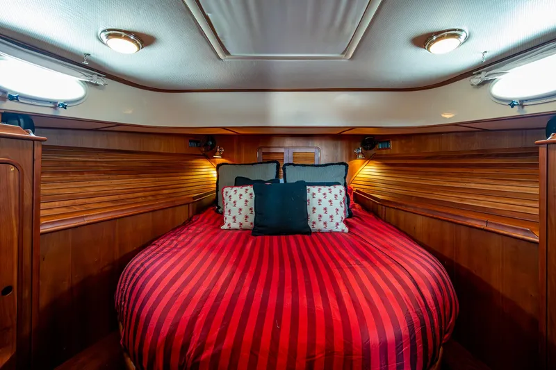 Slide: The Image of Luxurious 2006 Hinckley Talaria 44 MY yacht interior with elegant wood and patterned seating. - 24