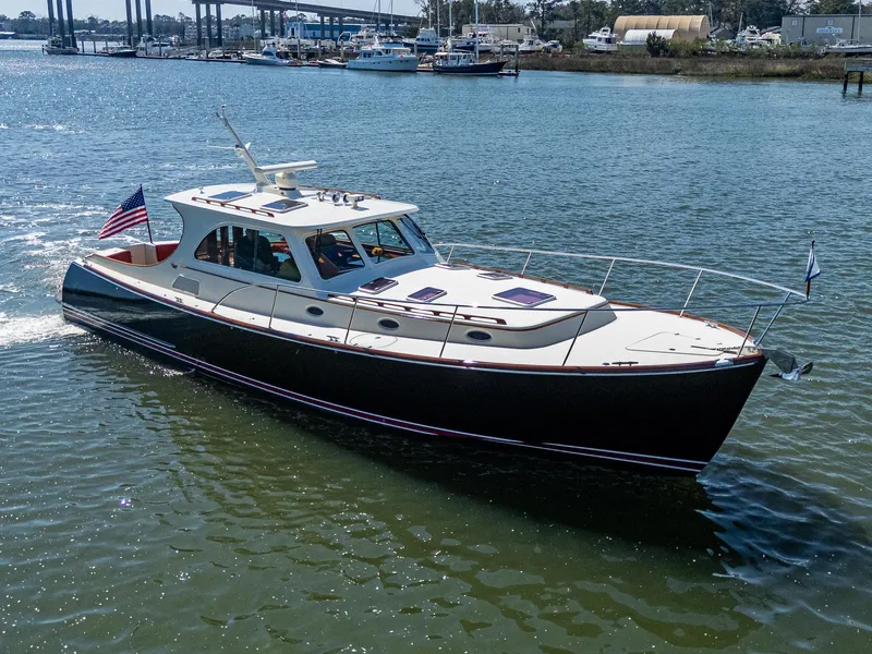 Slide: The Image of Hinckley Talaria 44 MY 2006 yacht "Double Expresso" cruising with American flag. - 4