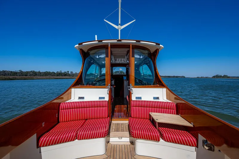 Slide: The Image of Luxurious 2006 Hinckley Talaria 44 MY yacht interior with elegant wood cabinetry and granite countertops. - 7