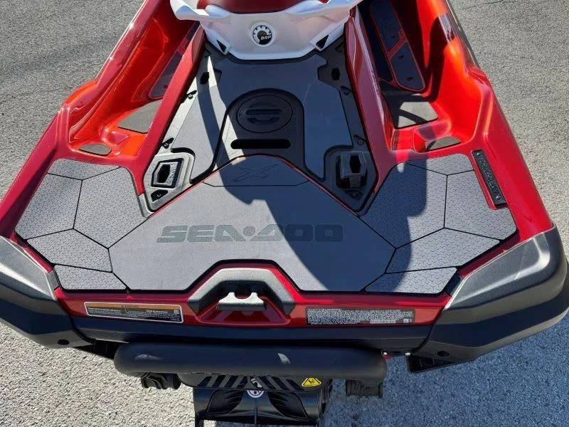 Slide: The Image of 2024 Sea-Doo RXT-X 325, red and black rear deck, close-up view. - 11