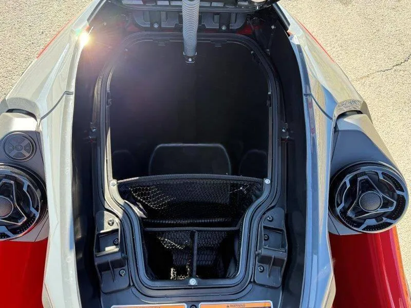 Slide: The Image of 2024 Sea-Doo RXT-X 325 storage compartment, open view, showcasing interior space. - 20