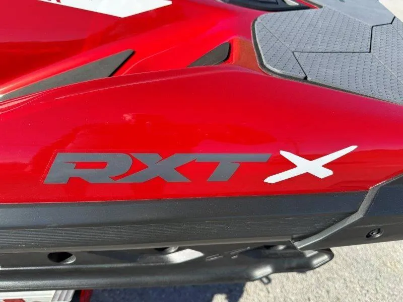 Slide: The Image of 2024 Sea-Doo RXT-X 325, red body with black accents, close-up view. - 25