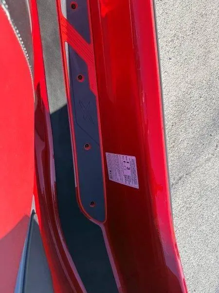 Slide: The Image of Close-up of 2024 Sea-Doo RXT-X 325 red body detail. - 34