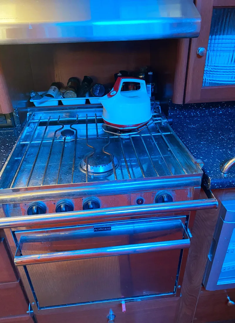 Slide: The Image of Stove and kettle in 2012 Hunter 50 Aft Cockpit yacht kitchen. - 11