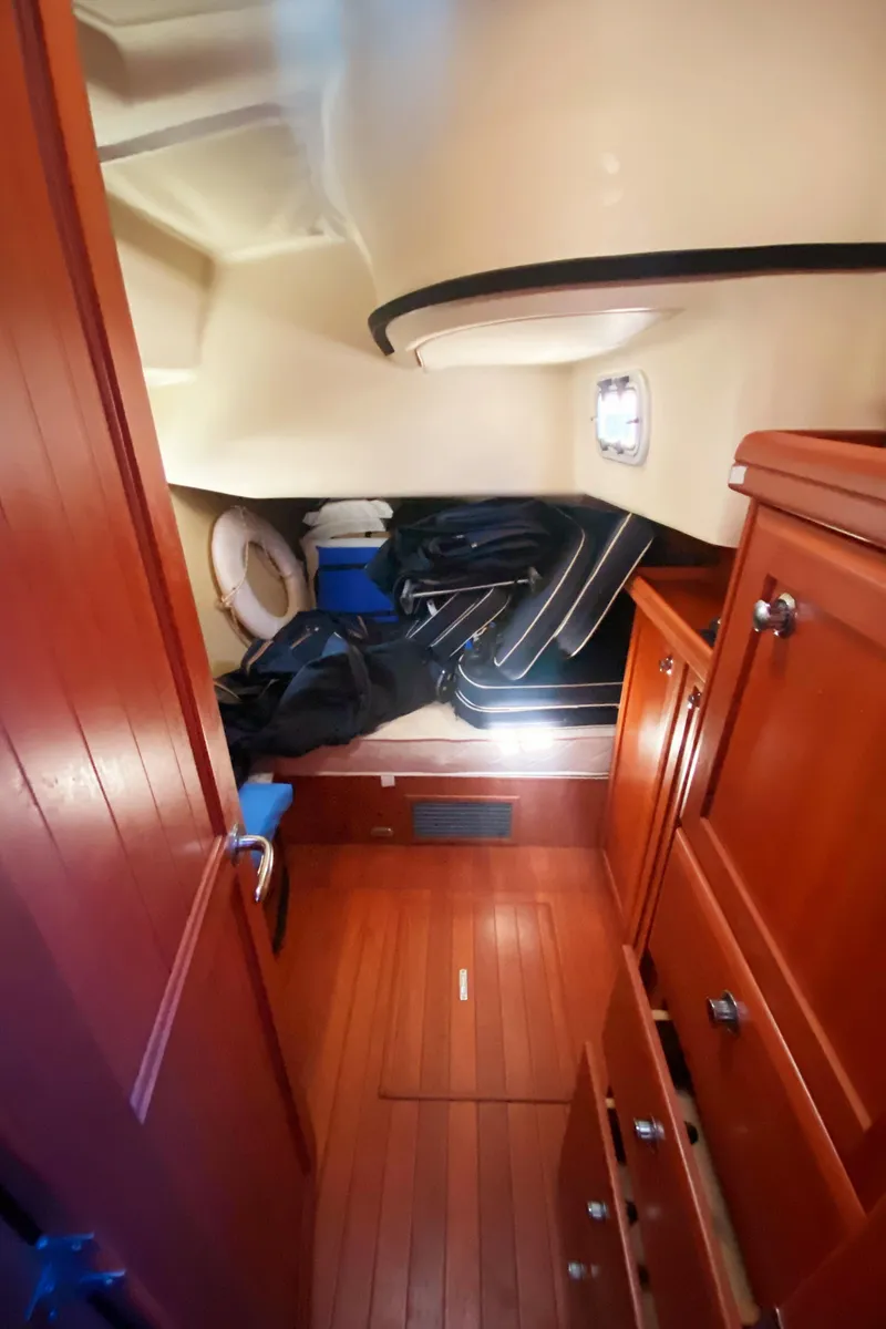 Slide: The Image of Interior cabin of 2012 Hunter 50 Aft Cockpit yacht with wooden cabinetry. - 18