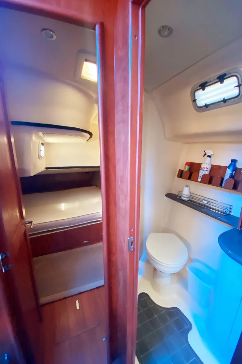 Slide: The Image of 2012 Hunter 50 Aft Cockpit yacht interior with bathroom and sleeping area. - 20