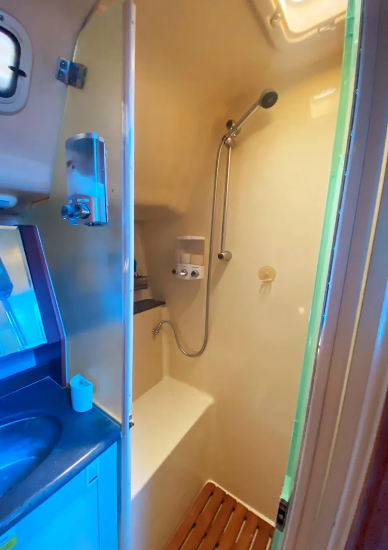 Slide: The Image of 2012 Hunter 50 Aft Cockpit yacht bathroom with shower and sink. - 22