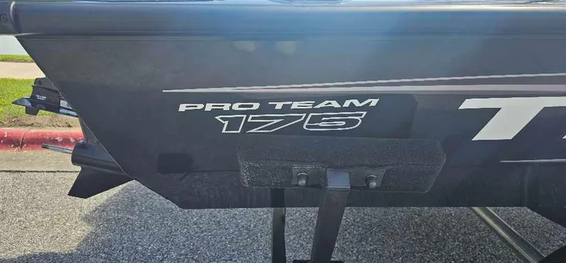 Slide: The Image of 2025 Tracker Pro Team 175 boat, rear view with model branding. - 2