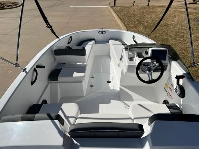 Slide: The Image of 2025 Tahoe T16 boat interior with seating and steering console. - 3