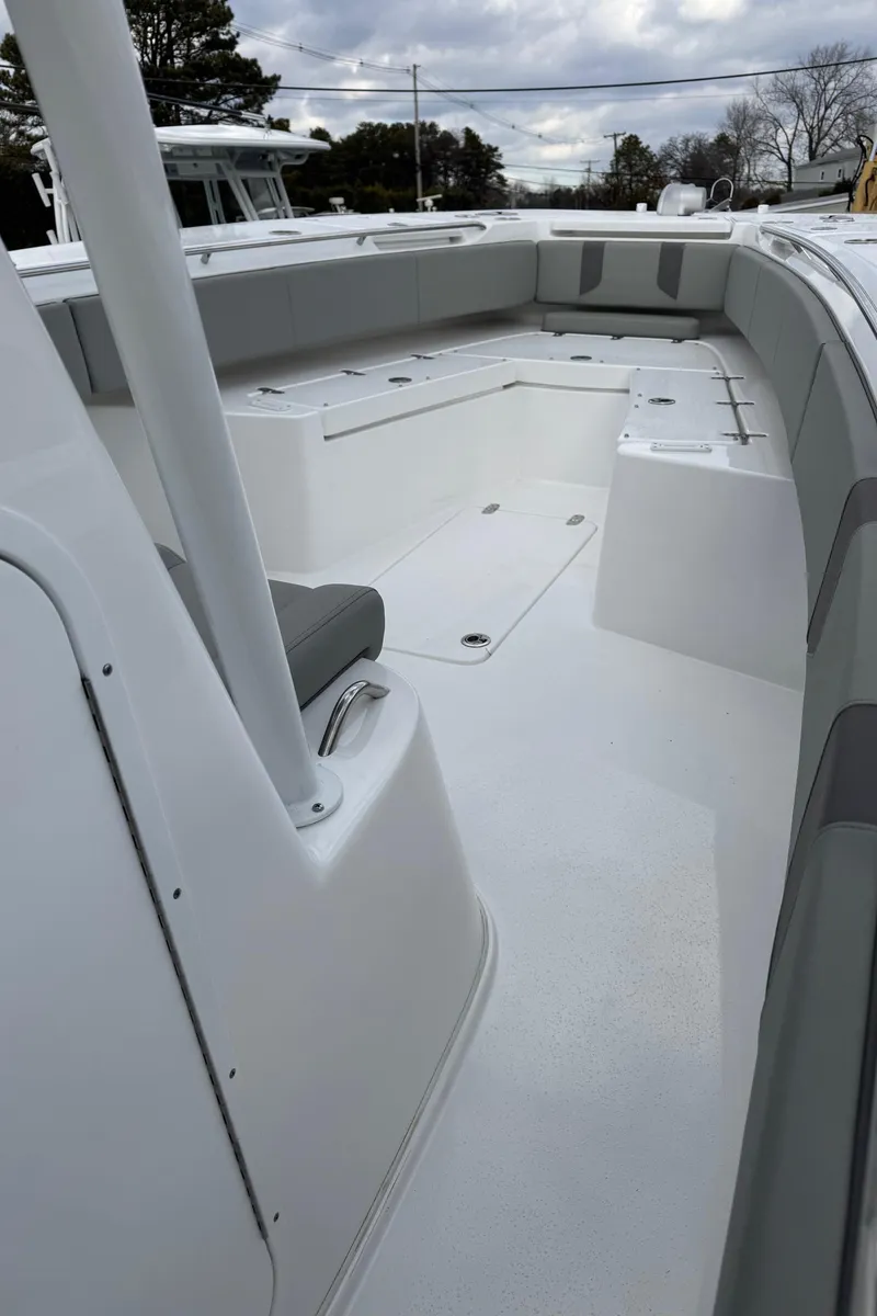 Slide: The Image of 2025 Cape Horn 34 XS boat interior with spacious seating and sleek design. - 11
