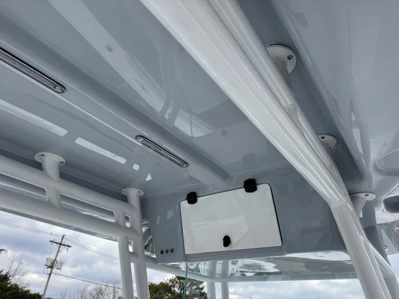 Slide: The Image of 2025 Cape Horn 34 XS boat interior ceiling with sleek design and modern fixtures. - 12