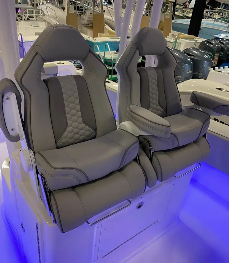 Slide: The Image of Luxury seating on 2025 Cape Horn 34 XS boat with ambient blue lighting. - 20