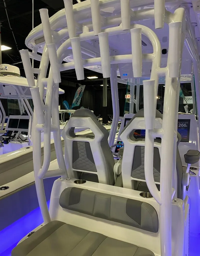 Slide: The Image of 2025 Cape Horn 34 XS boat interior with rod holders and seating. - 24